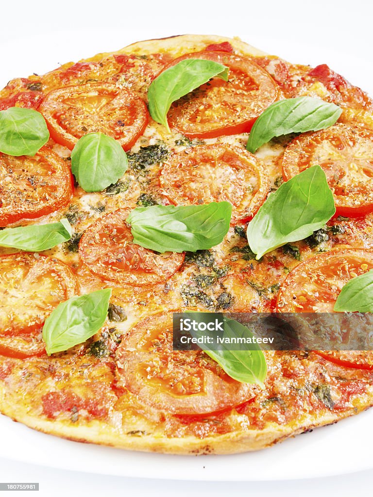 Margharita Pizza Margharita Pizza - with fresh tomatos, mozzarella and basil, close up Basil Stock Photo