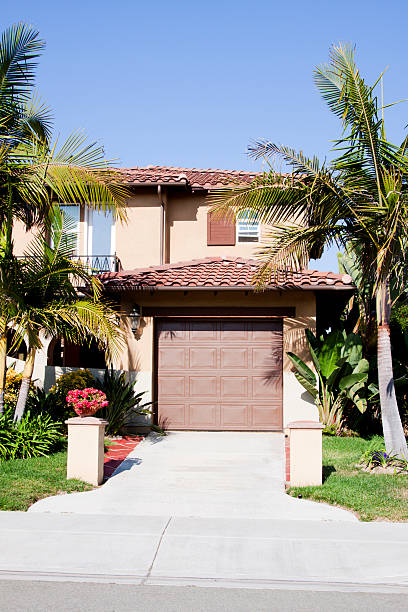 istock Stucco Home Exterior and Blue Sky 180756873