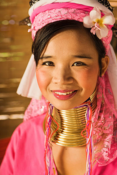 Portrait of Woman from Long Neck Karen Tribe "Portrait of a long-neck woman Padaung (Karen) tribe, Mae Hong Son Province in Northern Thailand." padaung tribe stock pictures, royalty-free photos & images