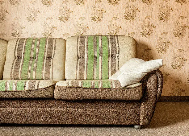 retro sofa in the living room of an old house