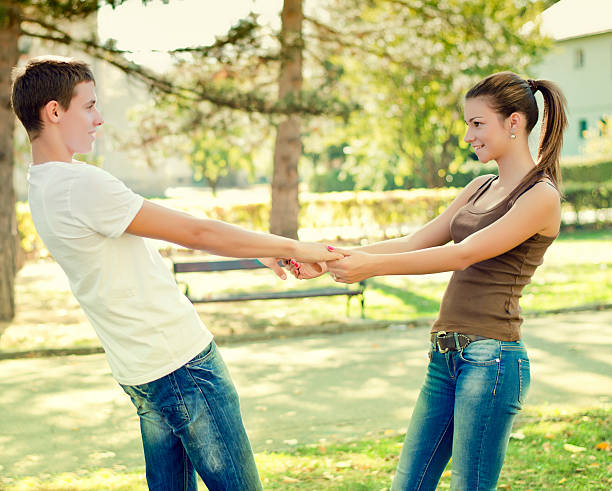 istock Young couple having fun at the park 180757852