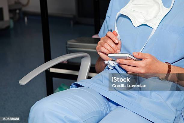 Anesthetist Using Smartphone Stock Photo - Download Image Now - Adult, Adults Only, Anesthesiologist