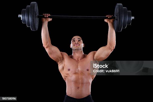 Bodybuilder Exercising Stock Photo - Download Image Now - 20-24 Years, Active Lifestyle, Activity