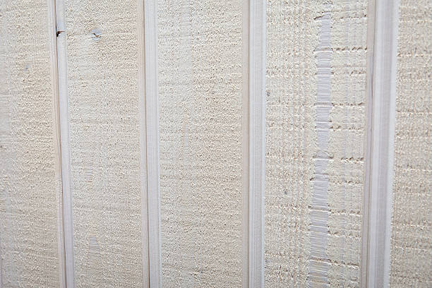 istock White stained plank of a wooden wall 180758482