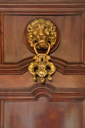 Just a detail that struck my fancy as a grab shot, those are the worst. A cast lion's head brass door knocker on an apartment door ( where else )in Cadiz