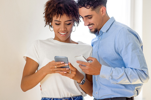 Couple using smartphone