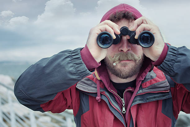 istock Fisherman with Beard and Moustache Exploring the Sea. 180759007