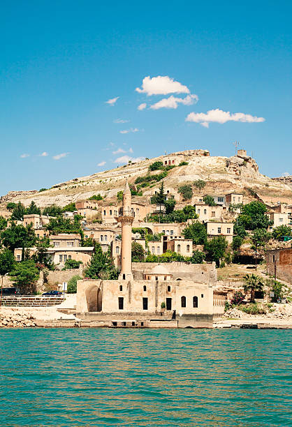 Sunken Town Old Halfeti "Halfeti village was submerged in the 1990s under the waters behind the dam on the Euphrates at Birecik. The town was therefore removed to the village of Karaotlak, the building of the new town is now complete." gaziantep city stock pictures, royalty-free photos & images