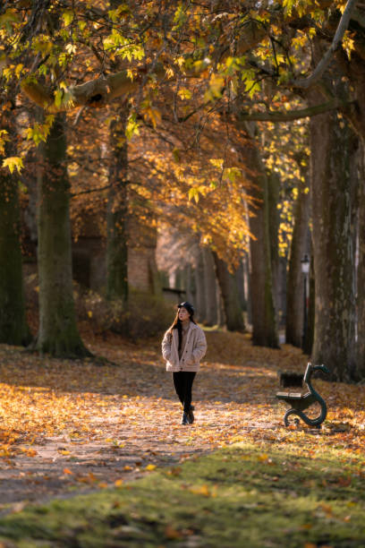 istock Woman in autumn 1807597760