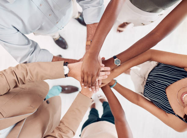 istock Teamwork, support and stack of hands of business people for community, trust and collaboration in office. Diversity, motivation and hands together of group of workers for agreement, goals and growth 1807599423