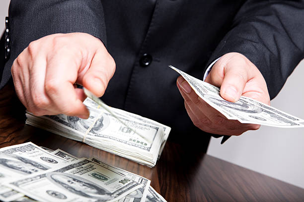 istock Businessman and money 180760350