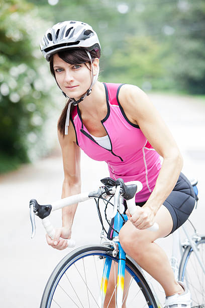 istock Woman Cycling 180760400