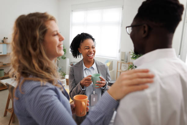 istock Colleagues having coffee break at the office 1807604771