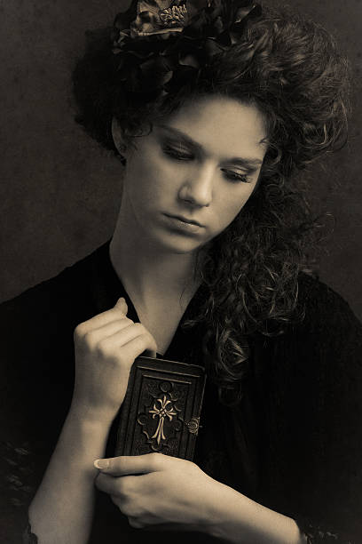 Girl holding a prayer book