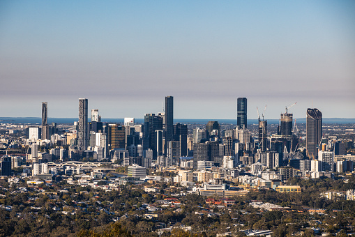 BRISBANE, AUSTRALIA - JULY 30, 2023: Brisbane skyline from Mount Coot-Tha lookout and observation deck at dusk in Brisbane, Queensland, Australia.