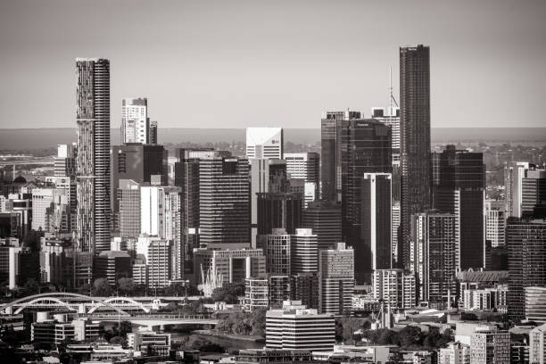 BRISBANE, AUSTRALIA - JULY 30, 2023: Brisbane skyline from Mount Coot-Tha lookout and observation deck at dusk in Brisbane, Queensland, Australia.