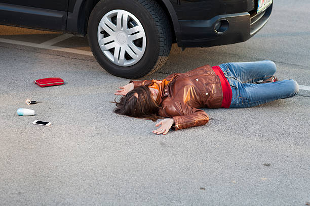 istock Traffic accident..young woman hit by a car 180760598