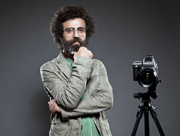 istock Mature man photographer 180761166