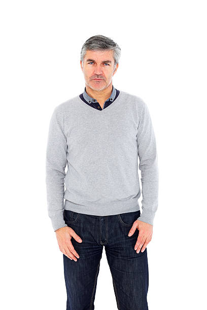 istock Mature man staring at you against white 180761235