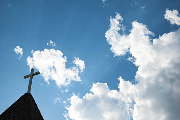 istock Church Steeple, Cross, and Sunset 180761358