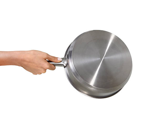 istock Woman Holding Steel Pan 180761769