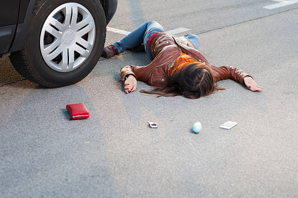 istock Traffic accident..young woman hit by a car 180761777
