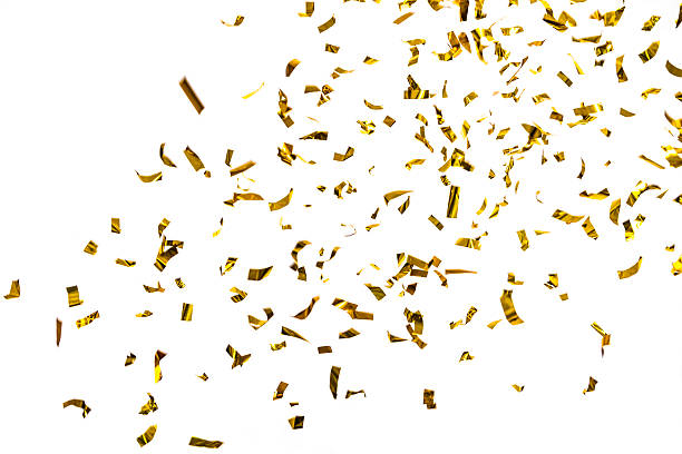 Golden metallic confetti falling, isolated on white background "Golden metallic confetti falling against white background, irregular shape." confetti photos stock pictures, royalty-free photos & images