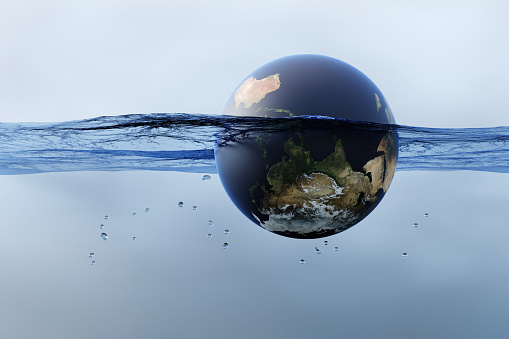 Planet earth floating in water under blue sky. Illustration of the concept of flooding and climate change

Source of Earth Map:
https://visibleearth.nasa.gov/collection/1484/blue-marble