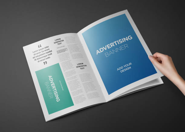 istock Hand Holding Newspaper Advertising Magazine Brochure Mockup 1807628158