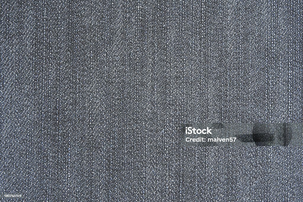 Texture di un materiale in denim - Foto stock royalty-free di Abbigliamento casual