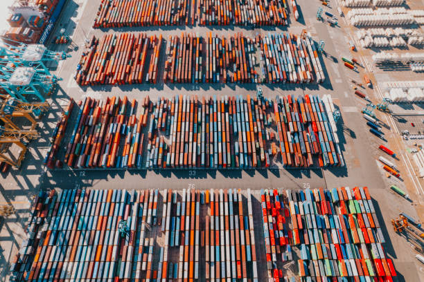 Commercial Dock With Containers And Cranes