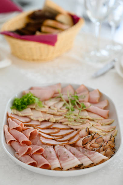 istock Meat cutting and its presentation on the festive table 1807685780
