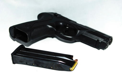 9mm nine millimeter handgun pistol and ammunition in magazine