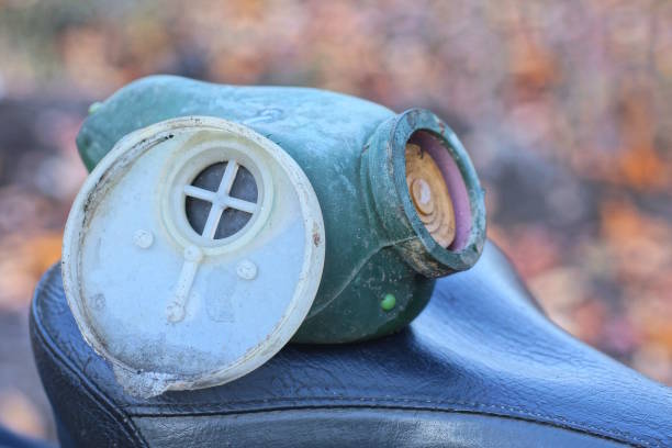 istock one old dirty white green respirator mask 1807700296