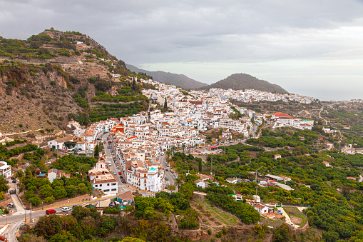 Elevated view of Frigilana, one of the famous Pueblos Blancos (white villages) of Andalucia, Spain. Inhabited for about 5000 years, the basis of the current town dates from the 9th century. Frigiliana was voted the prettiest village in Andalucia by the Spanish Tourist Board.