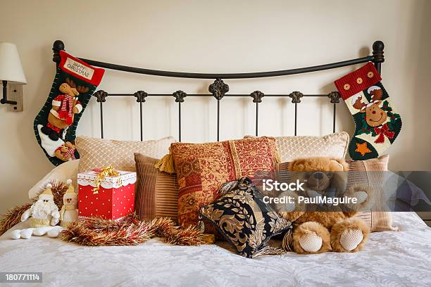 Bed Covered With Christmas Decorations Stock Photo - Download Image Now - Bed - Furniture, Bedroom, Beige