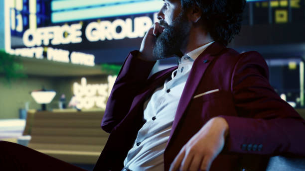 istock Financial advisor on phone call with accountant at night 1807733128