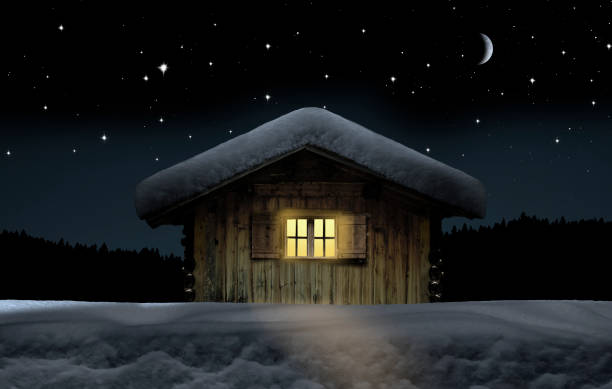 istock Snow-covered winter hut on a starry night 1807740940