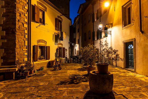 Night shot in an alley in Muggia, a coastal town in northern Italy near Trieste
