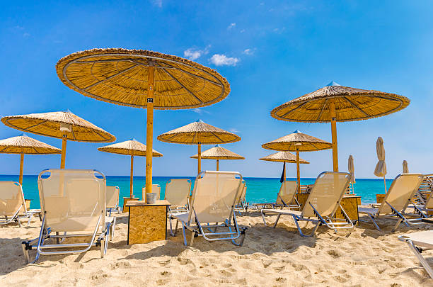 istock Straw umbrellas and sandy beach Kalamaki at Zakynthos 180777349