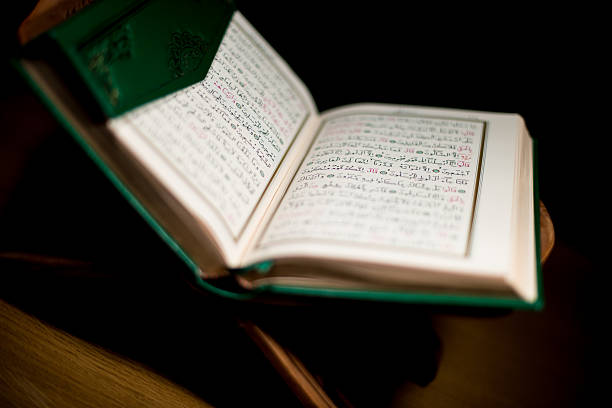 istock pages of holy koran the testament 180779577