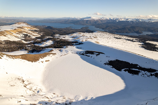 Frozen lake on Batea Mahuida volcano crater in La Araucania region, Chile Patagonia