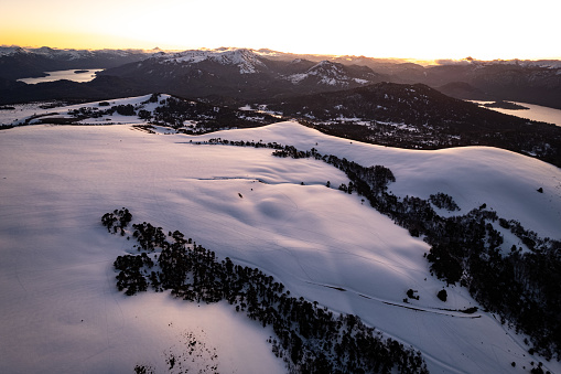 Sunset on the snowy mountains of the patagonian Andes in La Araucania region, southern Chile