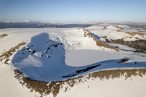 Frozen lake on Batea Mahuida volcano crater in La Araucania region, Chile Patagonia
