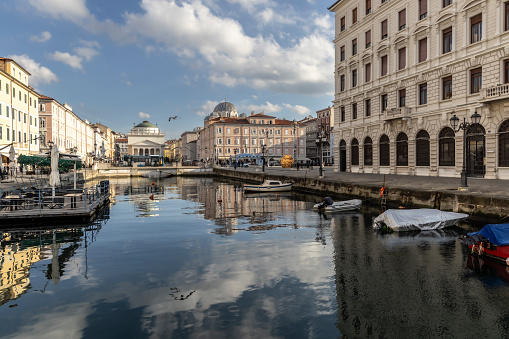 TRIESTE, ITALY – November 19, 2023: Scenic panoramic view of Canal Grande and architectural complex of the embankment