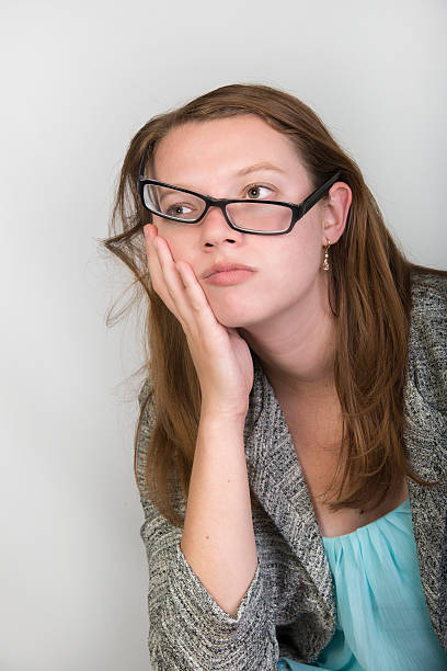 Attractive flustered young business woman