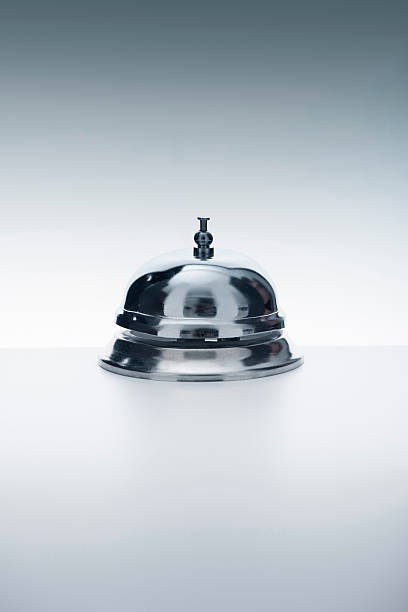istock Chrome service bell atop a white surface and background 180784969