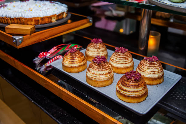 istock Christmas decorated desserts and sweets displayed for festive catering buffet. New Year cookies, cakes and candys 1807856142