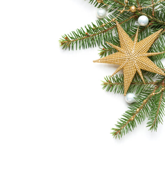 Fir branch with Christmas decorations  isolated on white  background.