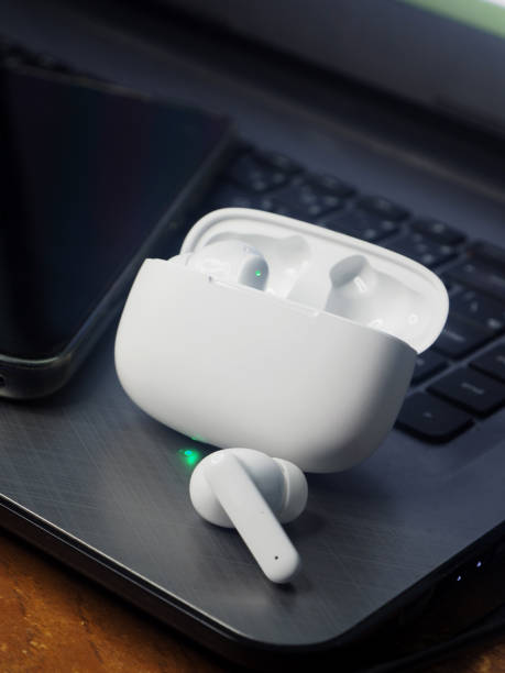istock white earbuds and smart phone connect together 1807886440
